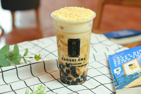 Delicious bubble tea in a plastic cup, perfect for refreshing drink lovers.